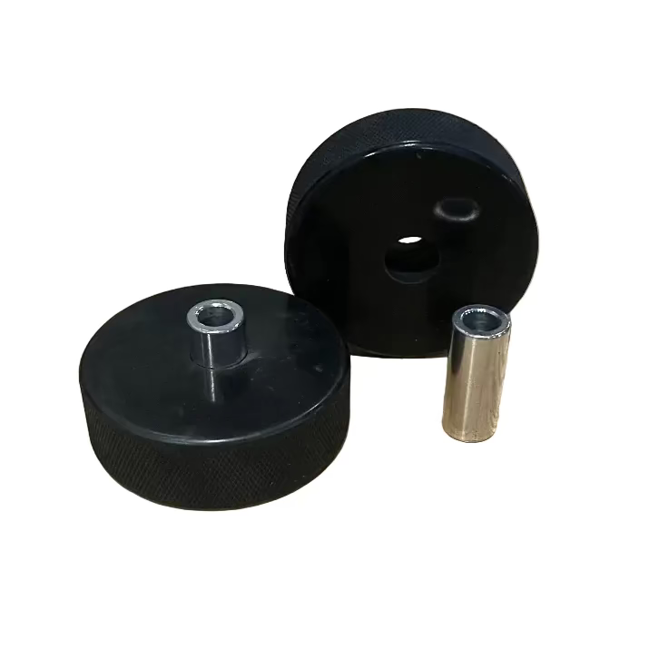 Two drilled lifting pucks with two long pins.