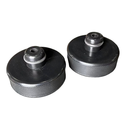Two black pucks for Tesla Model Y and Tesla Model 3