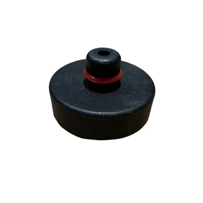 Tesla jacking puck with washer to hold it in place.